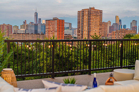 a balcony with a city skyline